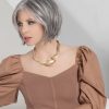 Model wearing short grey/white wig.