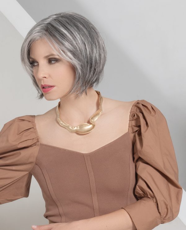 Model wearing short grey/white wig.